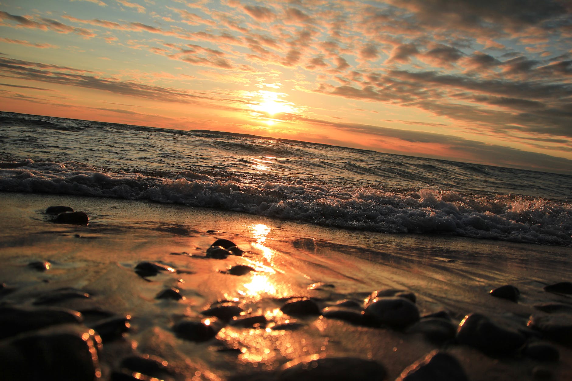 ocean taken photo during sunset